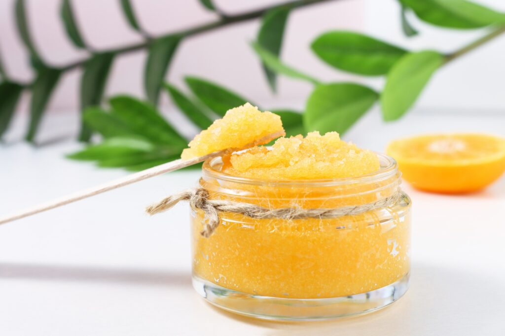 Body scrub with citruses front view.