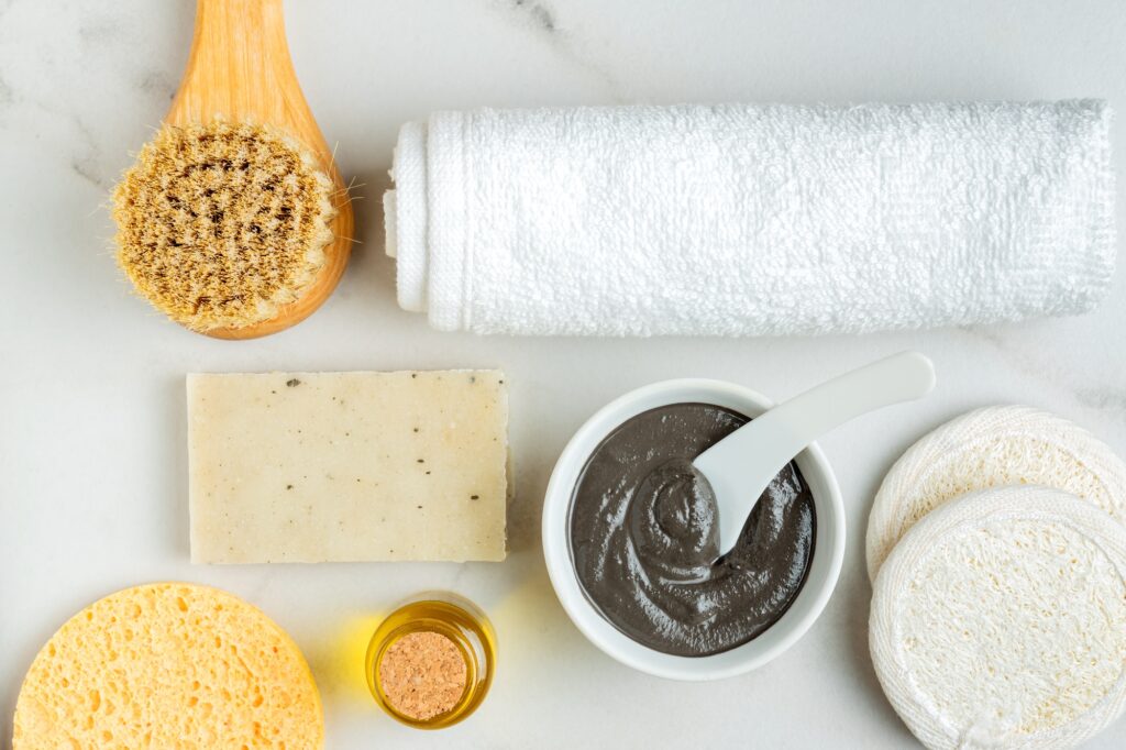Cosmetic clay. clay facial mask on a light background. spa accessories. natural cosmetics